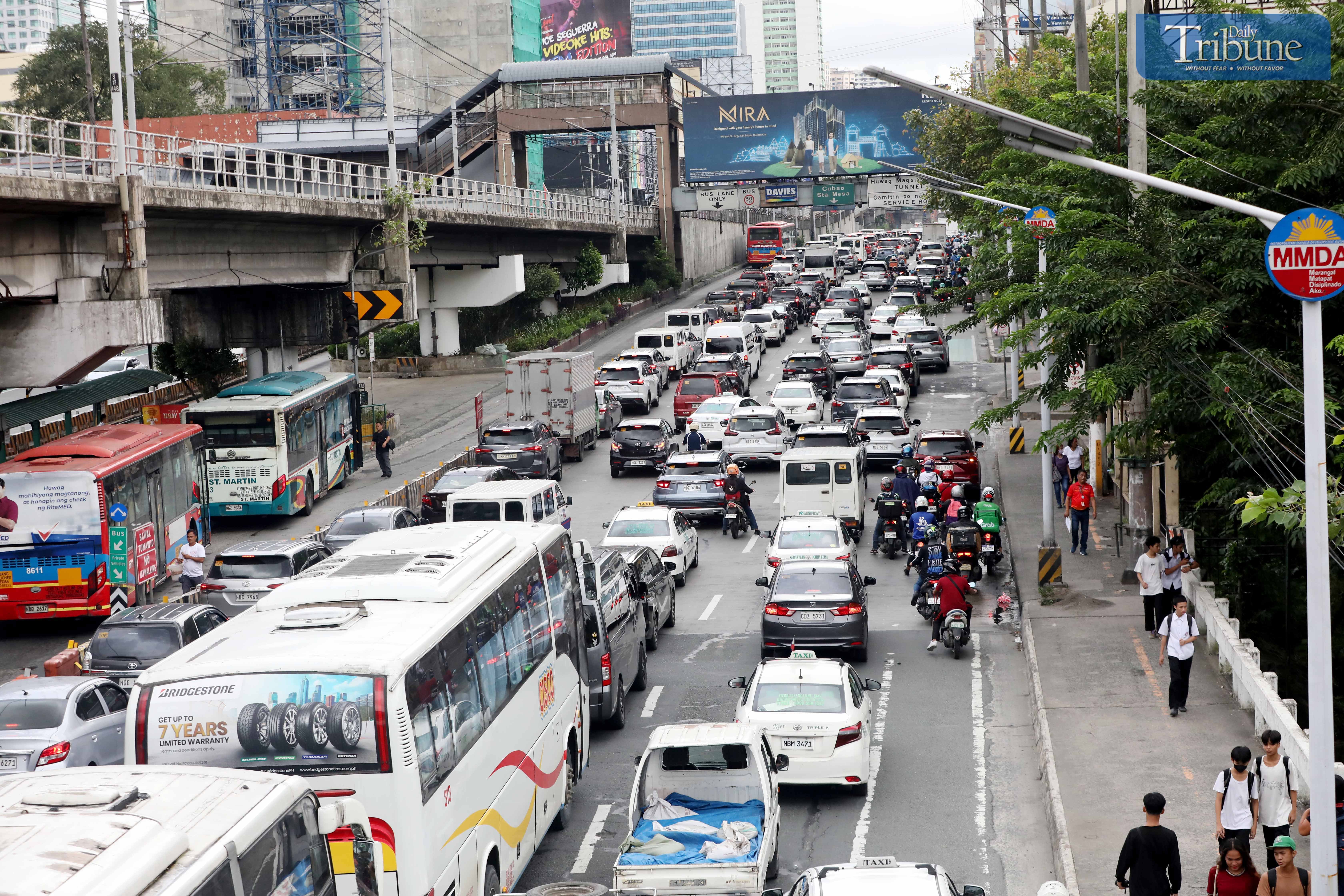 LOOK: Heavy traffic is observed along EDSA Southbound in Kamuning going to Cubao, Quezon City on Friday afternoon, 13 September 2024.